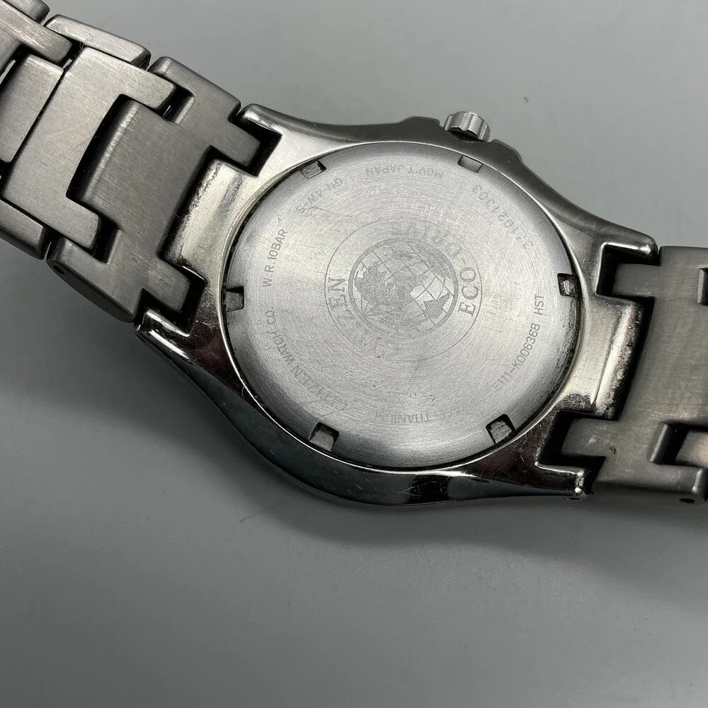 Citizen Eco-Drive Titanium Mens Watch 40mm Black Dial WR 100 E111-K006368 7.25